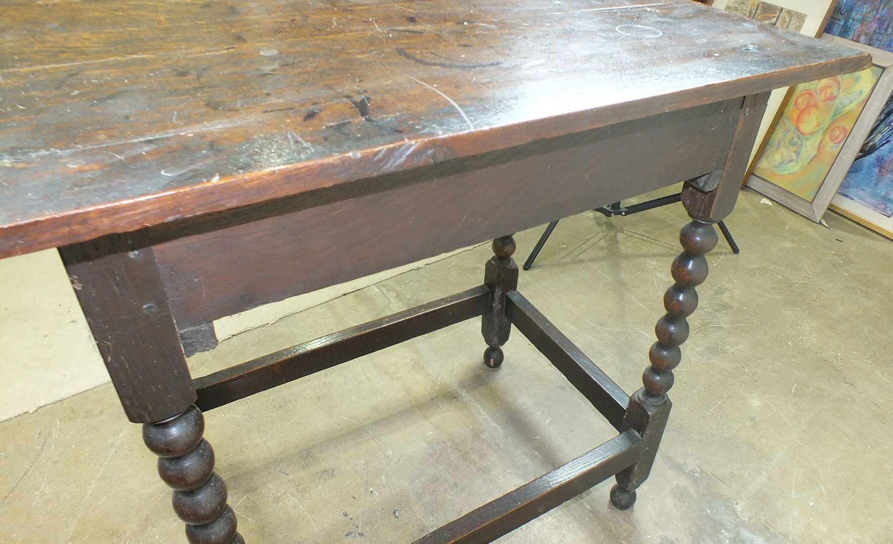An antique oak sideboard, the rectangular top above a frieze drawer on bobbin-turned legs joined - Image 2 of 2