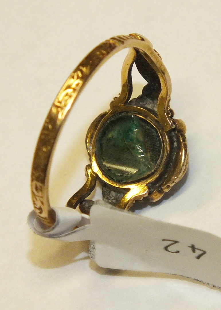 An early 19th century mourning ring set a cluster of pearls and red and green stones with locket - Image 3 of 5