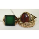 Two gold rings, one set agate, size O and a 9ct gold ring set green paste, size P½, total wt 13.3g.