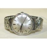 Omega Geneve, gent's manual wrist watch with silvered dial, baton numerals and steel case and