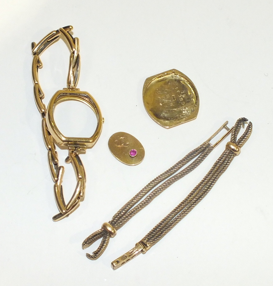 A small 15ct gold plaque and a 15ct gold watch bracelet, (a/f), 10g, also an 18ct gold watch case