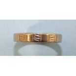 A white metal wedding band with Oriental hallmarks, size P, (tests as platinum), 6.3g.