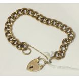 A 9ct rose gold bracelet of hollow curblinks with padlock clasp, 17g.