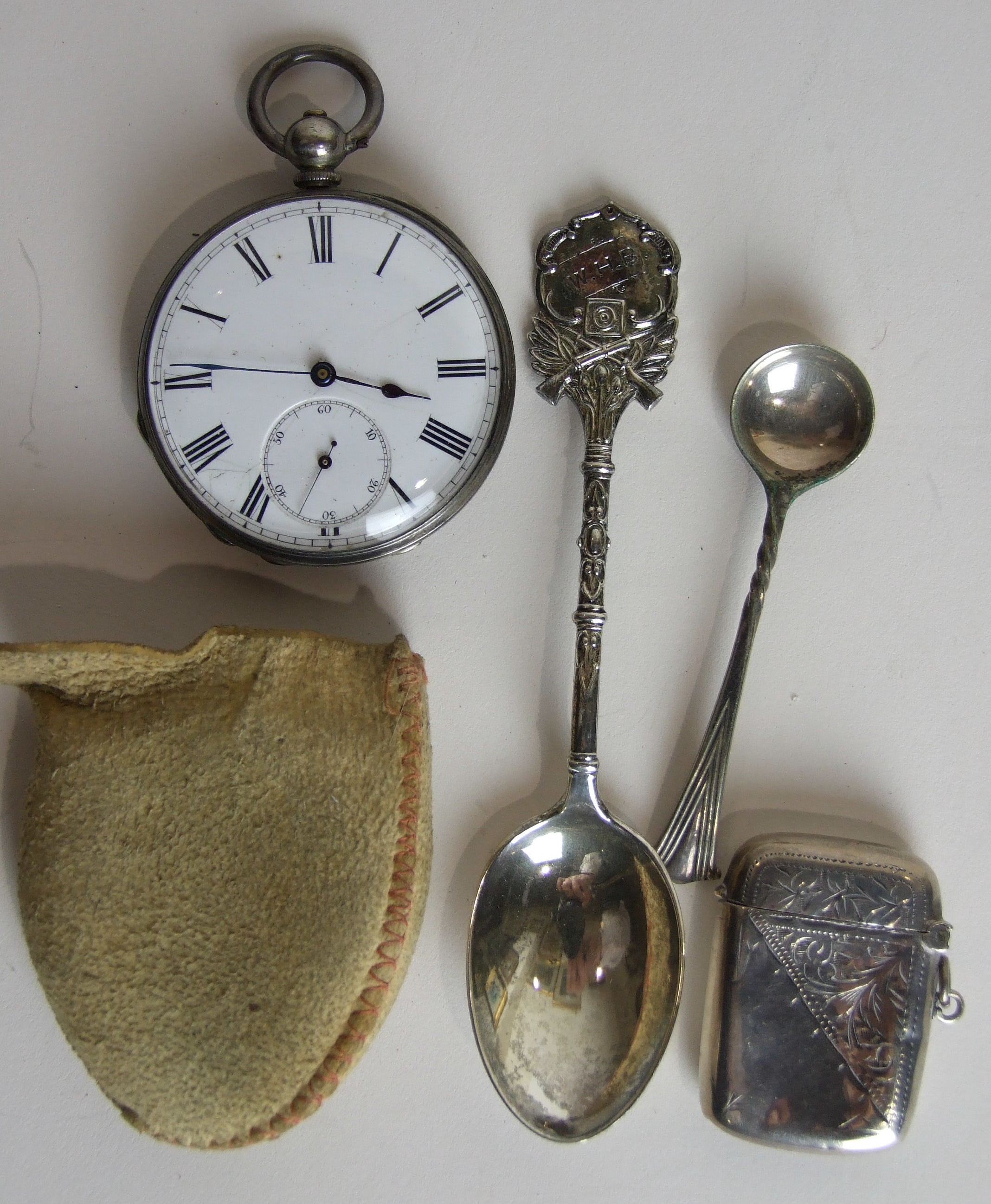 A silver cased open face keywind pocket watch (af), a small silver Vesta case and other items.