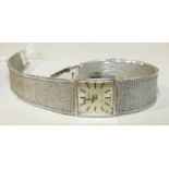 Tissot, a lady's Tissot "Stylist" wrist watch with 9ct white gold mesh strap, total weight 23.7g, (