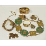 A Chinese 18ct gold and jade bracelet (af, one jade plaque missing), an 18ct gold ring set opals (