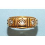 A Victorian 18ct gold gipsy ring set three old-cut diamonds, (mount a/f), size L, 3.3g.