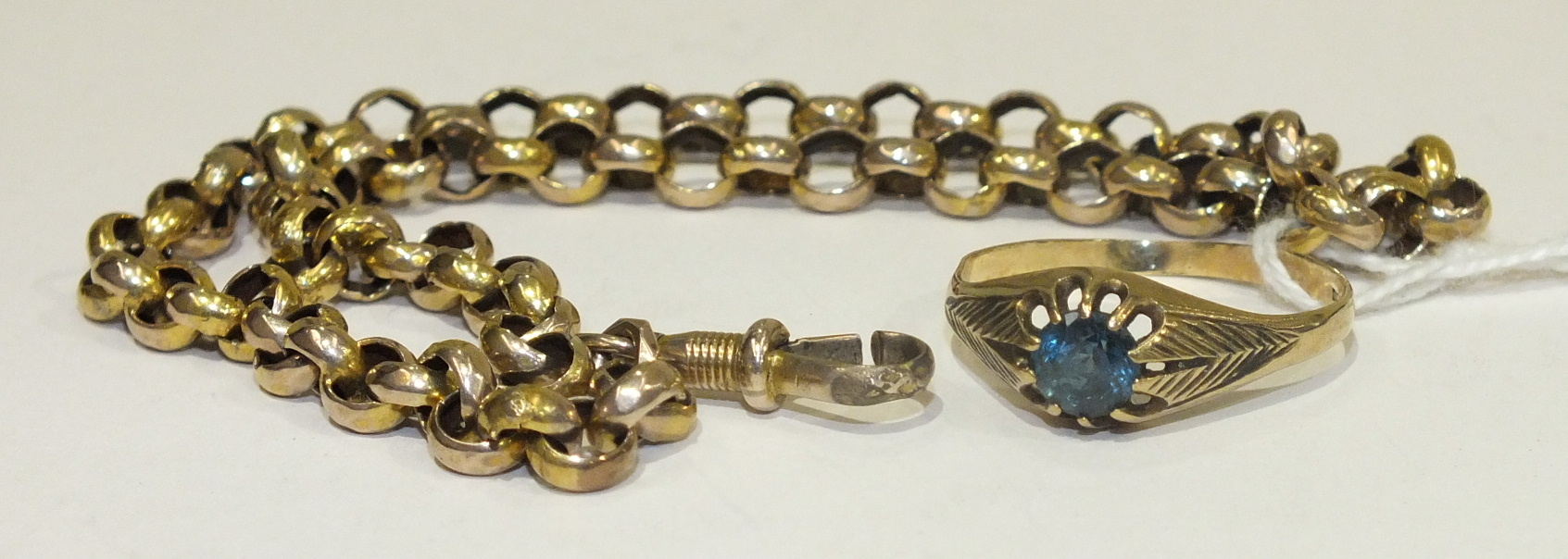 A 9ct gold ring set blue topaz, size Y, and an unmarked length of belcher link chain, total wt 15.