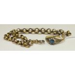 A 9ct gold ring set blue topaz, size Y, and an unmarked length of belcher link chain, total wt 15.