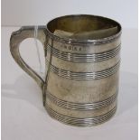 A George III silver tankard with ribbed tapered body, maker IT, London 1799, 8cm high ___6oz.