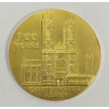 A 22ct gold medallion commemorating 900 years of Westminster Abbey, limited edition 634/900,