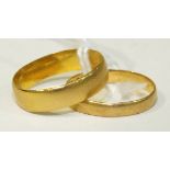 Two 22ct gold wedding bands, sizes J and L, 4.2g.