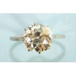 A solitaire diamond ring, claw set a brilliant cut diamond of approximately 3cts, claw set in