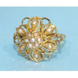 A yellow gold cluster ring set pearls, marked 21k, size N, 4.7g.