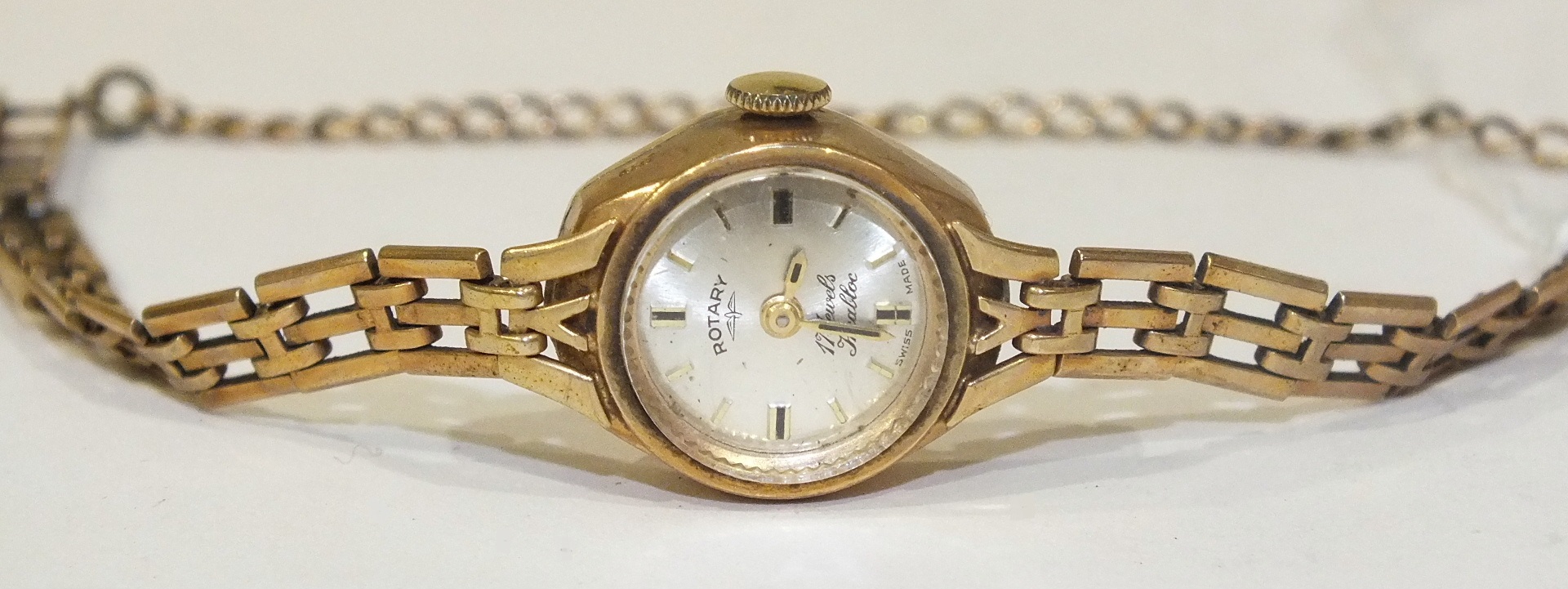 Rotary, a ladies Incabloc wrist watch with 9ct gold case and gate link bracelet, total weight 15.2g,