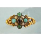 A 19th century gem-set ring set a cluster of turquoises and pearls around a foiled purple stone,