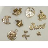 Nine various gold charms, 10g, (9).