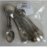 A set of six silver apostle coffee spoons, two Tiffany & Co silver gilt mustard spoons and two other