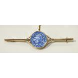 An unusual bar brooch inset blue and white willow pattern circular miniature enamelled plate, reg