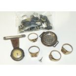 A small silver-cased fob watch, a silver wrist watch case, 53 white metal letters and four brass