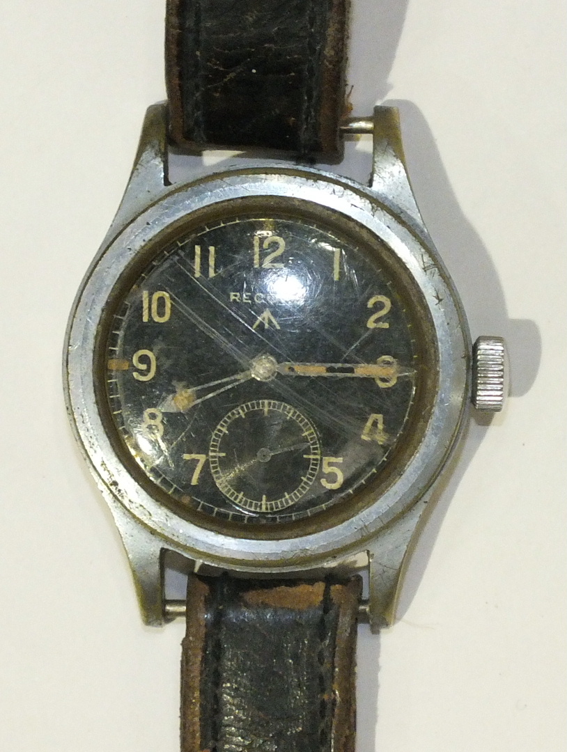 Record, a military wrist watch, the black dial with Arabic numerals, seconds subsidiary and marked