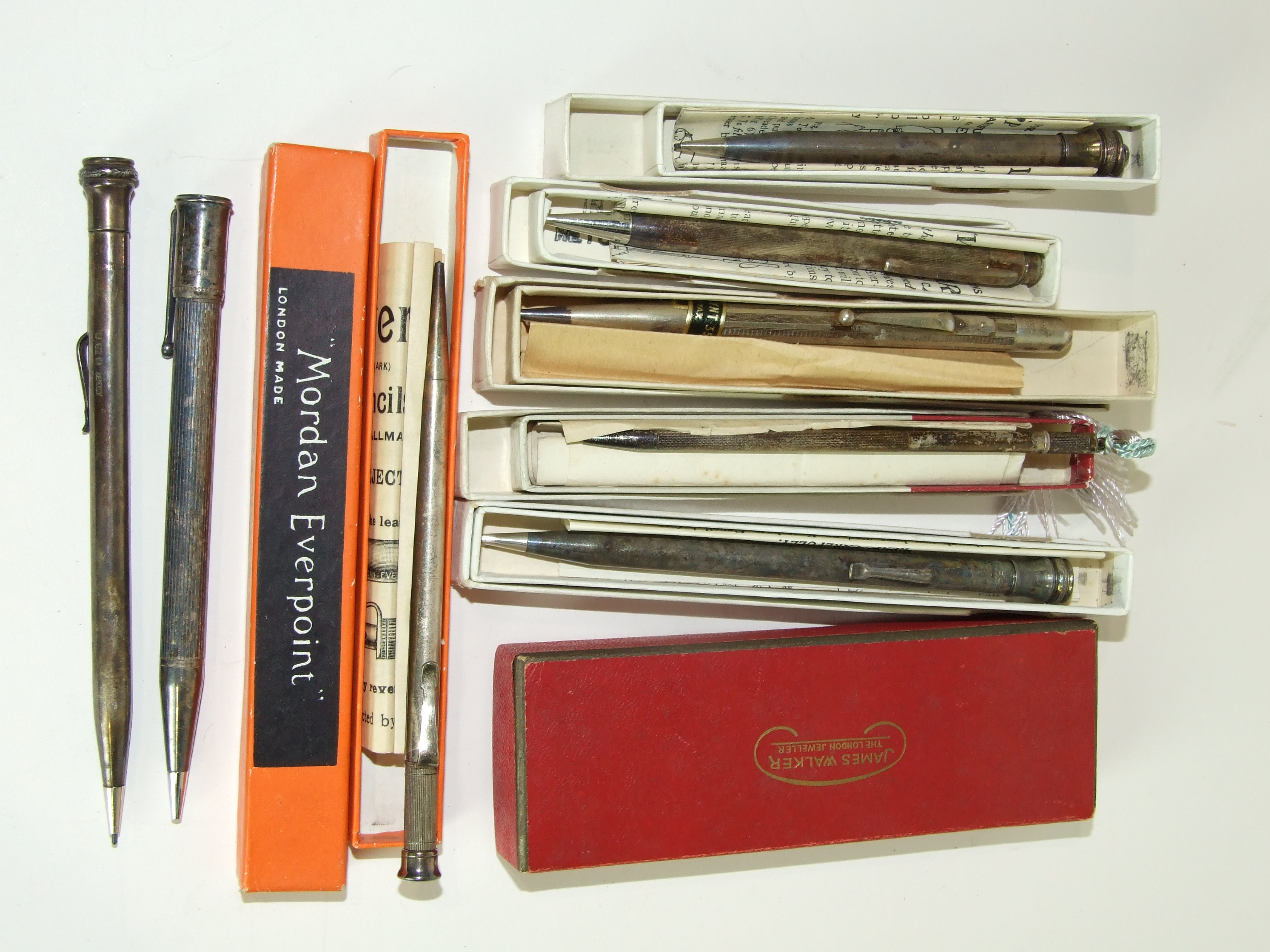 A Sampson Mordan & Co "Everpoint" silver pencil, boxed, and eight other silver pencils including