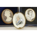 A shell cameo brooch commemorating the 1977 royal silver jubilee in 9ct gold rope twist mount,