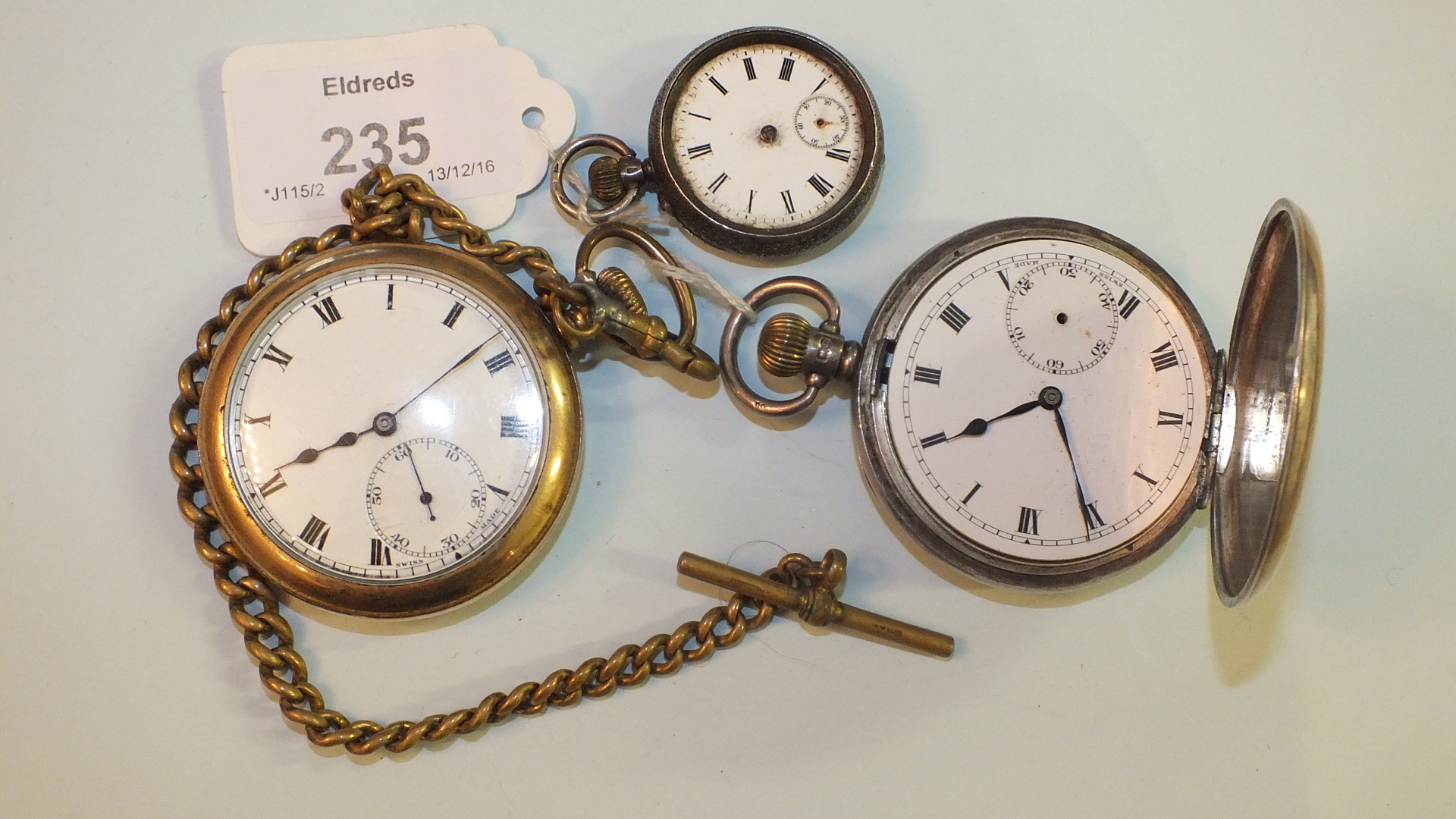 A silver hunter cased keyless pocket watch, (af, bezel, glass and subsidiary hand missing), a gold