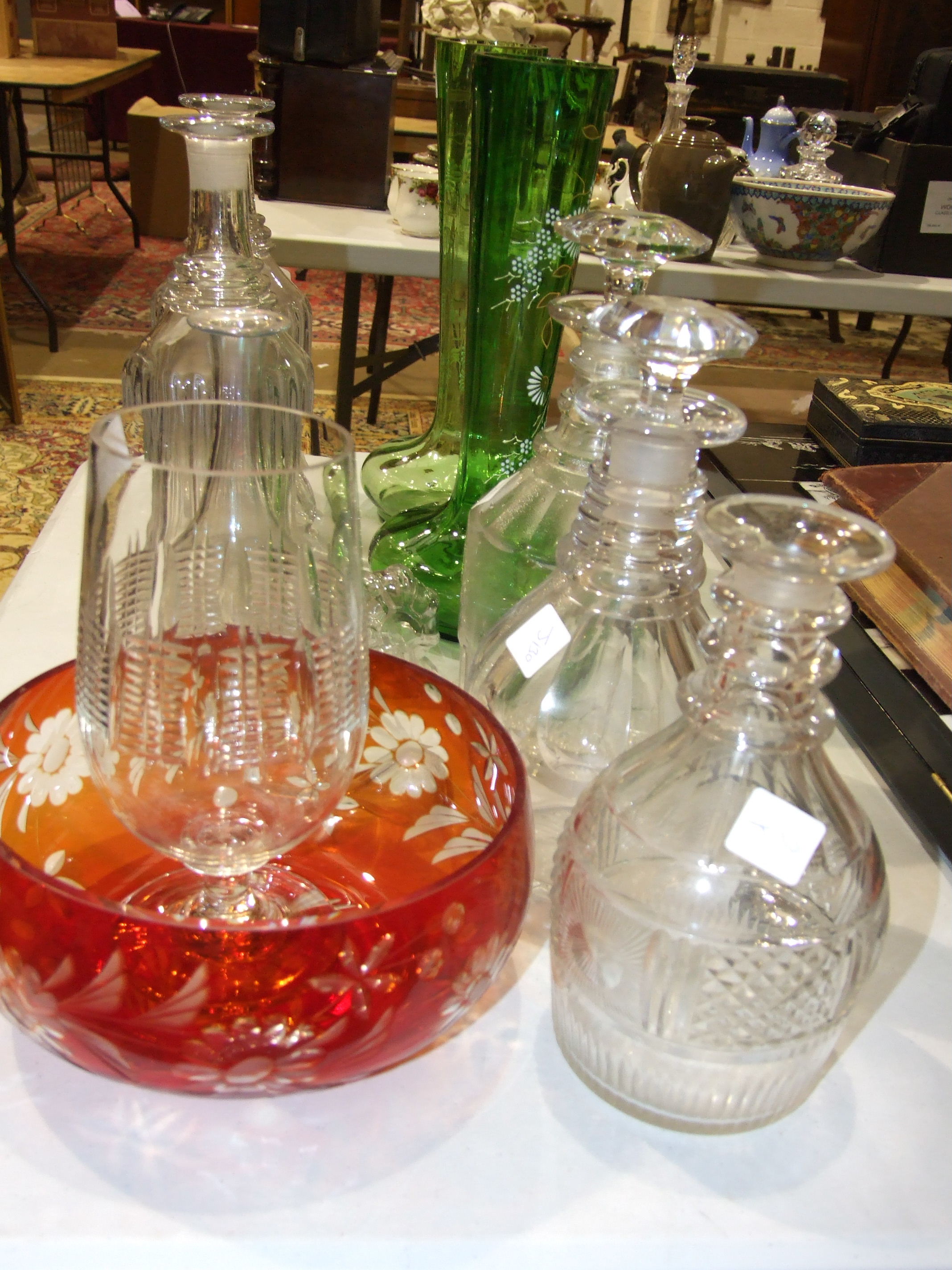 A pair of mallet shaped glass decanters with stoppers, 34cm high, three other decanters, a celery - Image 2 of 2