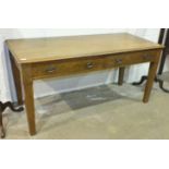 An oak rectangular top two-drawer table on square tapered legs, 151 x 67cm, 72cm.