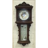 A Maple & Co. walnut aneroid barometer, the architectural form case with circular ceramic dial and