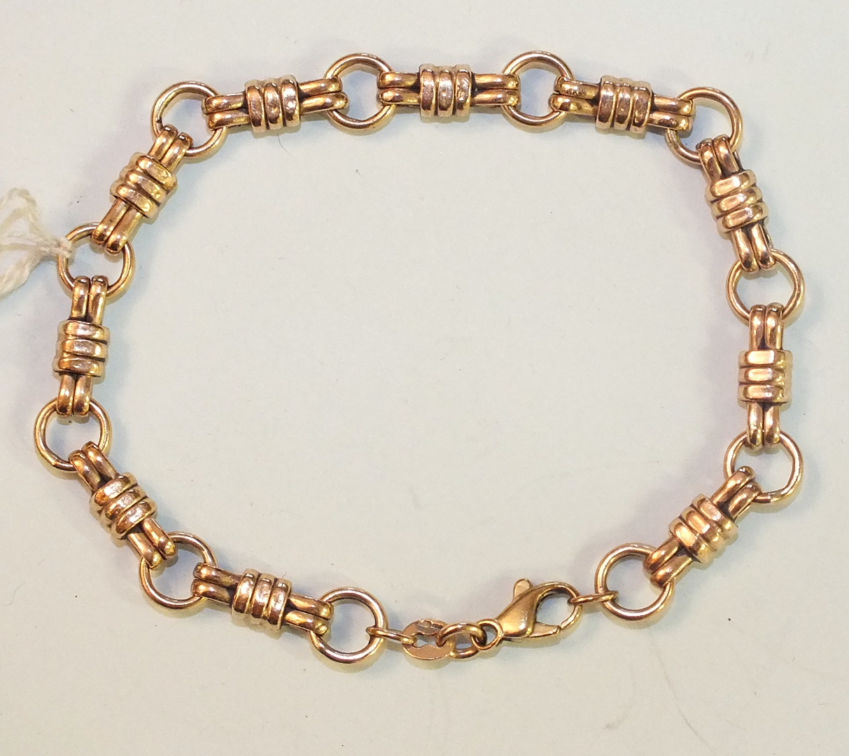 A 9ct gold bracelet of fancy links, 7g.