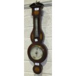 An inlaid mahogany aneroid barometer and thermometer with silvered dial, marked Negretti & Zambra,