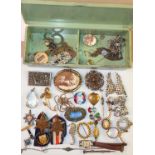 A quantity of costume jewellery and medals, etc, in Bakelite box.