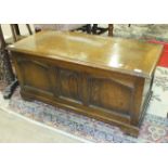 A mid-20th century oak blanket box with hinged lid, 106cm wide.