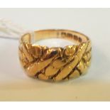 An 18ct gold ring, size O½, 6g.