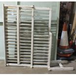 An antique painted pine country house kitchen plate rack, 125cm wide, 140cm high.