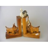 A Pair of wooden carved Scotty dog bookends together with a musical hound dog