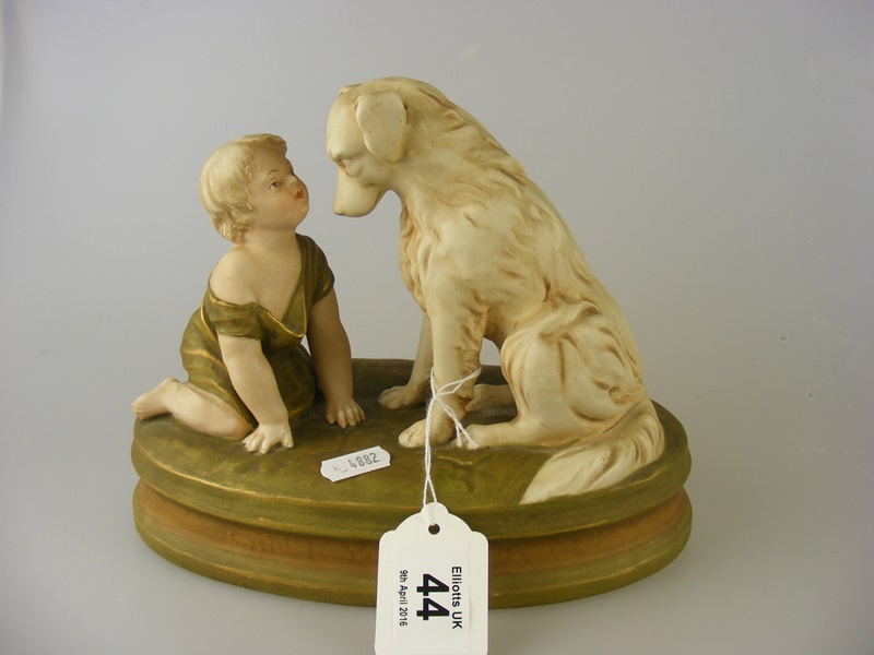 Royal Dux Figural group of a child and a dog