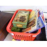 A small carton of assorted curios to include a Chinese coin buckle and other curios,