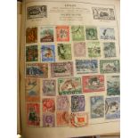 Quantity of World Stamps in Blue Strand Stamp Album.