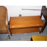 A teak low coffee table