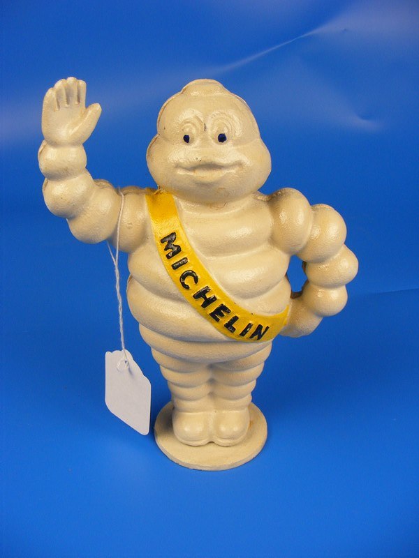 A cast Michelin man CONDITION REPORT: approx 22cm tall