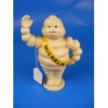 A cast Michelin man CONDITION REPORT: approx 22cm tall