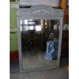 A large over mantle mirror distressed look