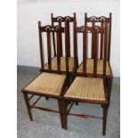 Four arts and crafts style dining chairs