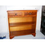 Yew wood reproduction bookcase fitted two small drawers