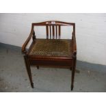 An Edwardian line inlaid piano stool