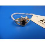 Diamond and sapphire 9ct gold ring