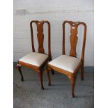 A set of four Queen Anne style stained dining chairs